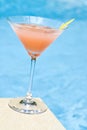 Pink Grapefruit Cocktail by the Pool Royalty Free Stock Photo
