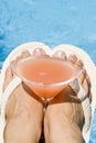 Pink Grapefruit Cocktail by the Pool Royalty Free Stock Photo