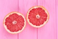 Pink grapefruit halves with clipping path. Royalty Free Stock Photo