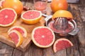 Pink grapefruit juice on wood Royalty Free Stock Photo