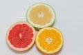 Pink Grapefruit, Orange and Sweety cut in half Royalty Free Stock Photo