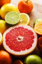 Pink grapefruit and other citrus fruit Royalty Free Stock Photo