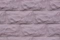 Pink gray brick wall background. New blocks on concrete texture. Royalty Free Stock Photo