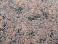 Pink-gray granite and old cement. background, texture. the parapet of the River. Granite stone abstract texture background. Royalty Free Stock Photo