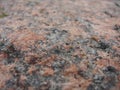 Pink-gray granite and old cement. background, texture. the parapet of the River. Granite stone abstract texture background. Royalty Free Stock Photo