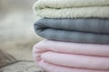 Pink and gray plaid with folded towel close-up Royalty Free Stock Photo