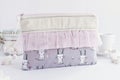 Pink and gray zipper pouch with rabbits