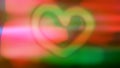 Pink and green blur image with heart shape