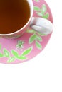 Pink and green tea cup and saucer Royalty Free Stock Photo