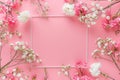 Pink greeting card with floral frame, top view. Mother's Day, Woman's Day, Easter, Valentine's Day, Wedding