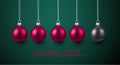 Pink and grey christmas baubles with loading 2022 sign