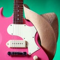 Pink Guitar and Weatern Hat Royalty Free Stock Photo