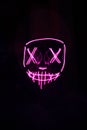 Pink Halloween mask with black background
