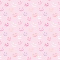 Pink Halloween repeat pattern vector design with pumpkin faces
