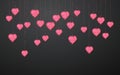 Pink handing shiny glitter glowing heart isolated on dark background. Valentines Day background. Vector illustration