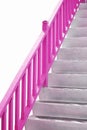 Pink handle bar on stairway
