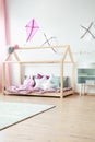 Pink handmade kite in bedroom Royalty Free Stock Photo