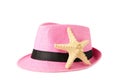 Pink hat and starfish isolated on white background Royalty Free Stock Photo