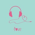 Pink headphones and cord in shape of heart. Blue background.