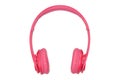 Pink headphones for listening to sound and music on a white background