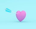 Pink heart with arrow on blue pastel background. minimal special occasion concept. idea of love and valentine day Royalty Free Stock Photo