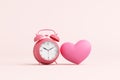 Pink heart and 3D pink alarm clock on light pink background. the concept is Dating appointment time, valentine\'s day, love.