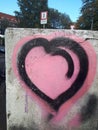 Pink heart graffiti in Amsterdam Zuid
