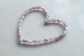 Pink heart. Kunzite is a natural pink stone for creating Jewelry. Natural crystals of pink and lilac stones