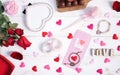 Pink, heart and love. Valentines` day concept or surprise anniversary gift for girlfriend on the wooden vintage background. - Royalty Free Stock Photo