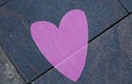 A pink heart on the pavement Royalty Free Stock Photo