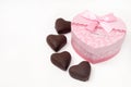 Pink heart shaped box with hearts of chocolate Royalty Free Stock Photo