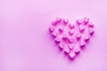 Pink heart-shaped marshmallows stacked on a pink background with space for copy. Marshmallow heart.Valentine`s day concept theme Royalty Free Stock Photo