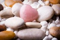 Pink heart stone on the spa stone background. Royalty Free Stock Photo