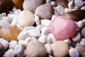 Pink heart stone on the spa stone background Royalty Free Stock Photo