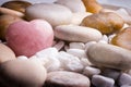 Pink heart stone on the spa stone background. Royalty Free Stock Photo