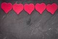 Pink hearts on a gray background. The symbol of the day of lover Royalty Free Stock Photo