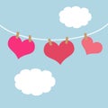 Pink hearts hanging on a clothes line