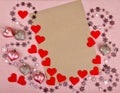 Pink hearts and a sheet of paper, Valentine`s day Royalty Free Stock Photo