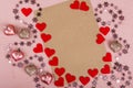 Pink hearts and a sheet of paper, Valentine`s day Royalty Free Stock Photo