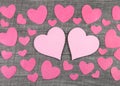 Pink hearts on wooden grey shabby chic background. Royalty Free Stock Photo