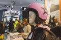 Pink helmet on display at EICMA 2014 in Milan, Italy