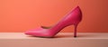 Pink High Heeled Shoe on Table Royalty Free Stock Photo