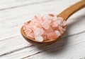 Pink himalaya salt in wooden spoon