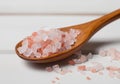 Pink himalaya salt in wooden spoon