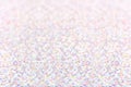 Pink holographic glitter with bokeh abstract background.