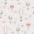 Pink hot air ballon and clouds seamless childish pattern. Hand drawn repeat pattern for wrapping, fabrik, textile or paper Royalty Free Stock Photo