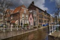 Pink house on a canal in Leiden, Holland