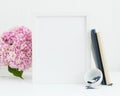 Pink hydrangea and white frame mockup. Pink, navy blue, and gold