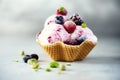 Pink ice cream with berries, strawberries, blueberries, raspberries, pistachios in waffle basket. Summer food concept Royalty Free Stock Photo