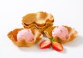 Pink ice cream in waffle baskets Royalty Free Stock Photo